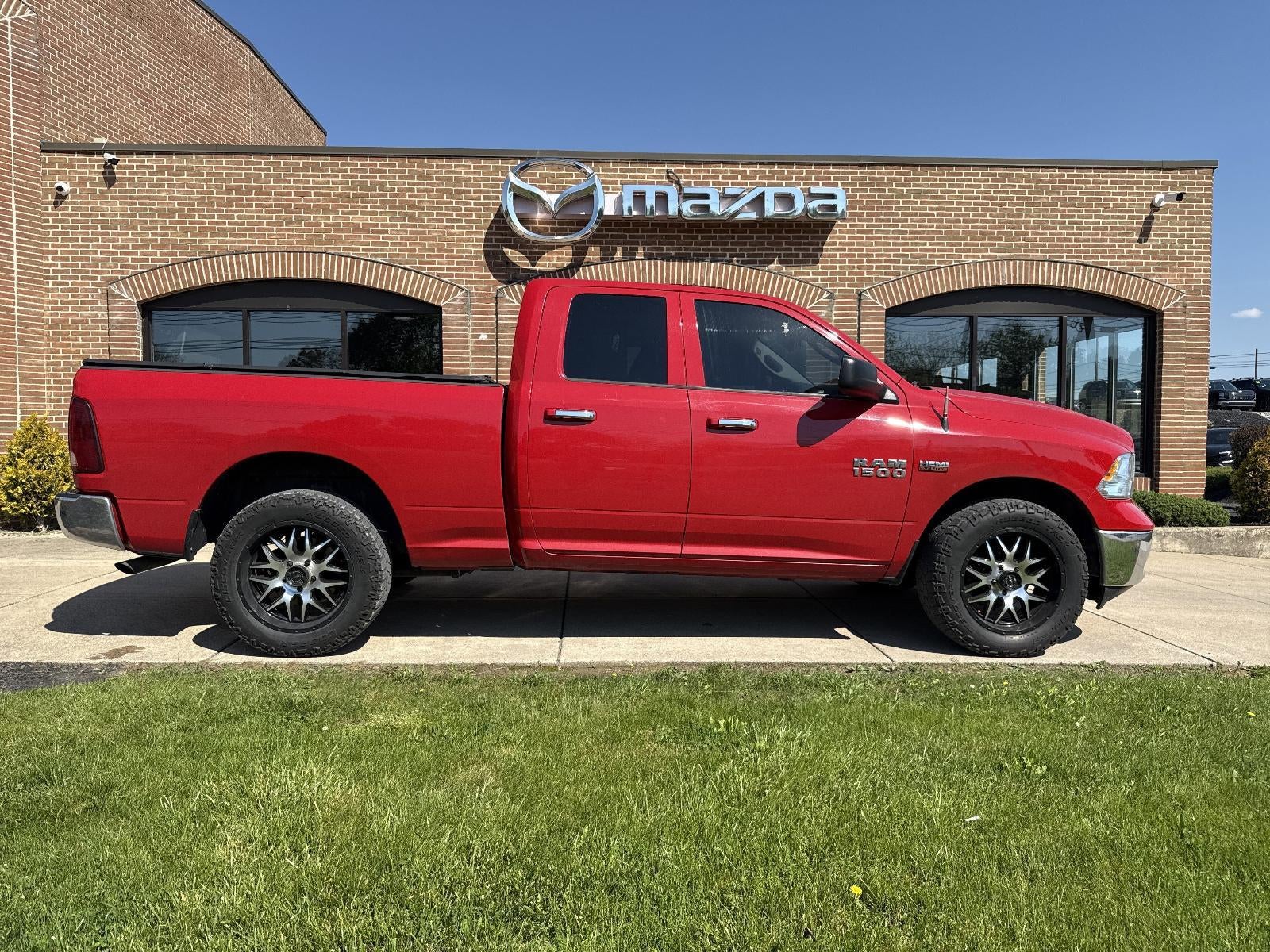 2013 RAM 1500 4WD Quad Cab 6.4 Ft Box SLT
