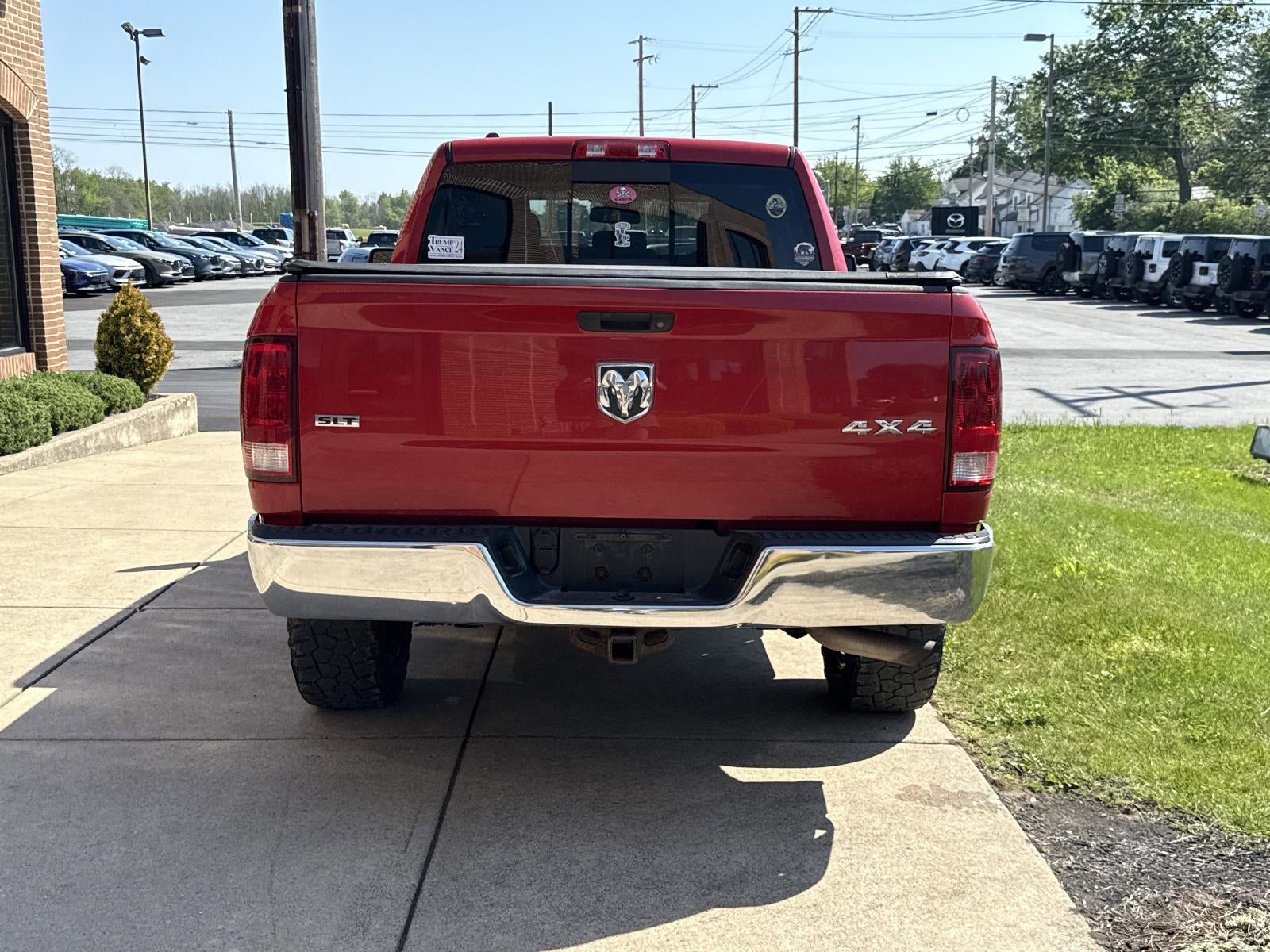 2013 RAM 1500 4WD Quad Cab 6.4 Ft Box SLT